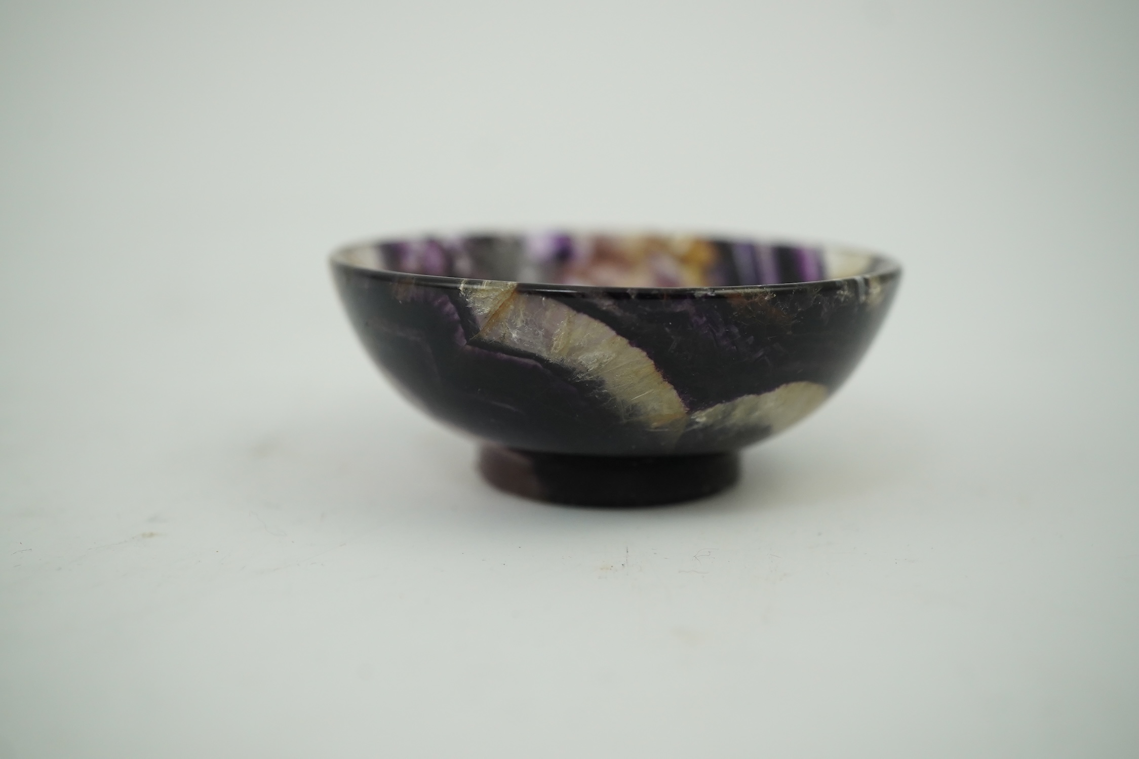 A small turned Blue John bowl, 6cm diameter. Condition - good